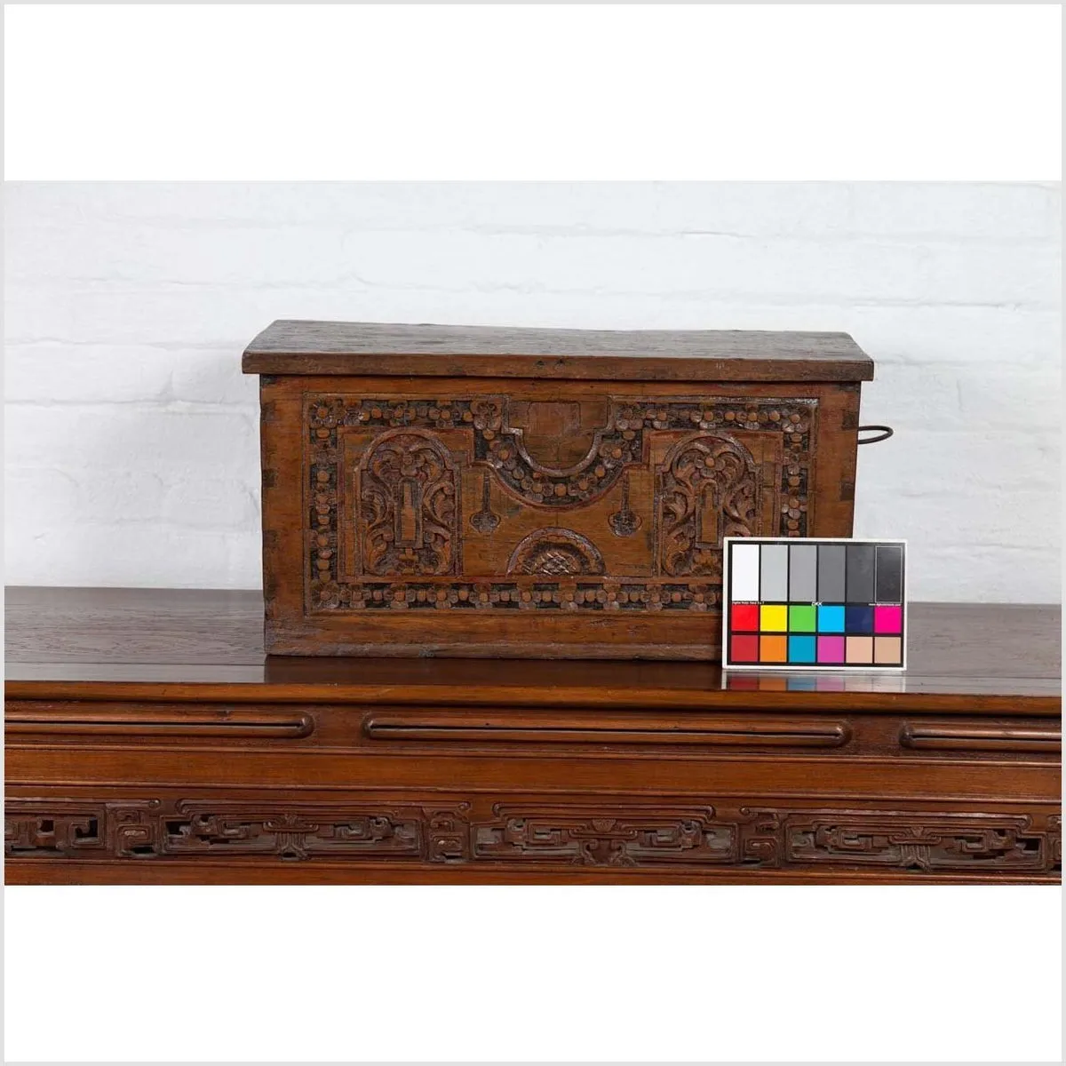 Antique Indonesian Decorative Wooden Box with Carved Flowers and Architecture